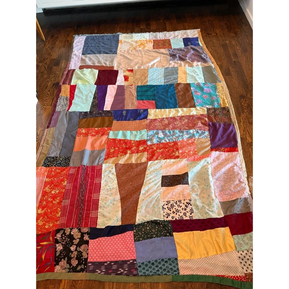 Old crazy Quilt. Patchwork silky fabrics